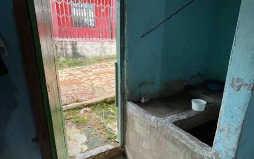 Propiedad con solar a bordo de calle