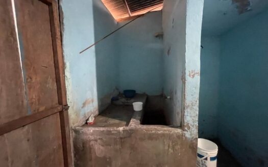 Propiedad con solar a bordo de calle